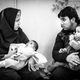 Zahra’s husband has come to visit her. He brought their baby boy so that Zahra can see him.
